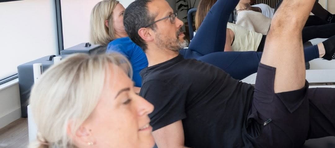 Beginners sit next to regulars.